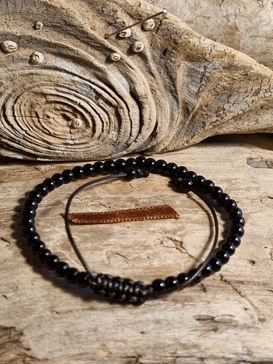 Obsidiāna aproce "Aizsardaībai" Izmērs 16.5 cm + aukla Bumbiņa 4 mm Brūna bantīte