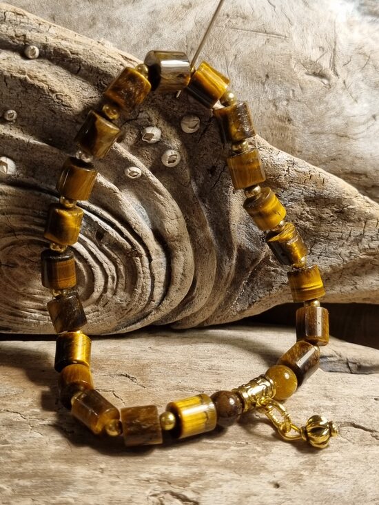 Tīģeracs aproce "Zelta bumbiņa'  Izmērs 18 cm Bumbiņa 7 mm