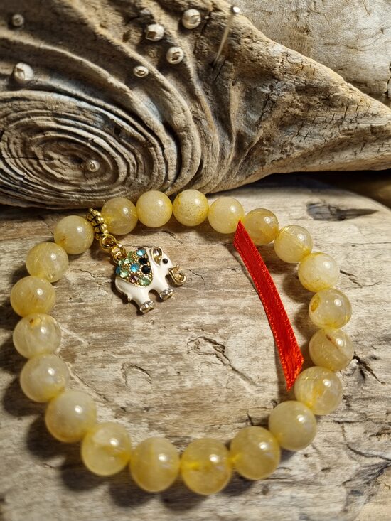 Rutilkvarca aproce "Laba diena" nr 2. Izmērs 18.5 cm Bumbiņa 9 mm Rozā bantīte