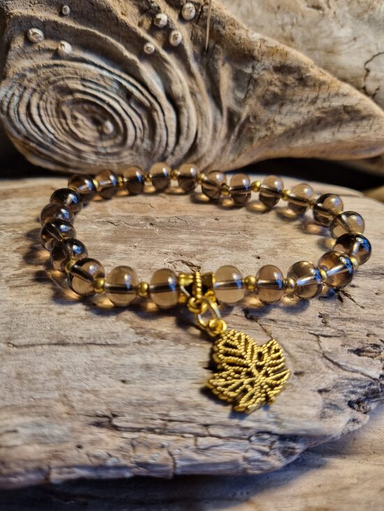 Dūmkvarca aproce "Zelta lapiņa" Izmērs 19 cm Zelta krāsas metāls Bumbiņa 8 mm