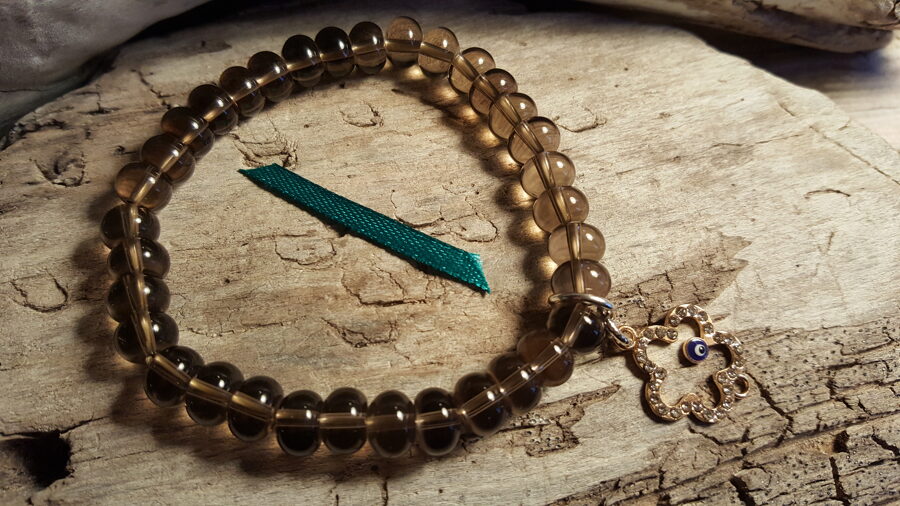 Dūmkvarca rokassprādze ar zelta krāsas aizsargaci Izmērs 18.5 cm Zaļa bantīte