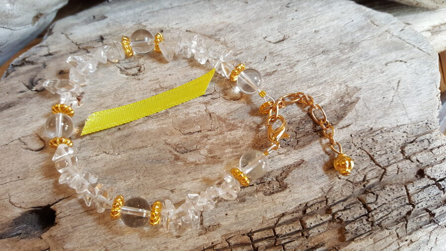 Kalnu kristāla rokassprādze "Jauka diena" nr 2. Izmērs 18 cm + ķēdīte Dzeltena bantīte Zelta krāsas detaļas